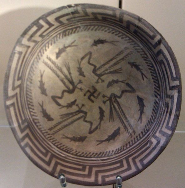 An ancient bowl dated to 4,000 BC discovered in Iraq which shows a swastika surrounded by forces and movements (photo copyright Dbachmann)