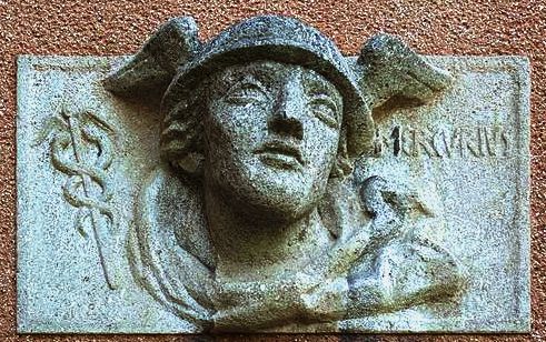 The god Mercury with his winged cap and caduceus The god Mercury with his winged cap and caduceus