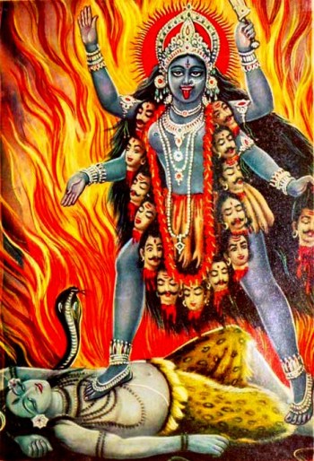 The Hindu goddess Kali standing on the god Shiva The Hindu goddess Kali standing on the god Shiva