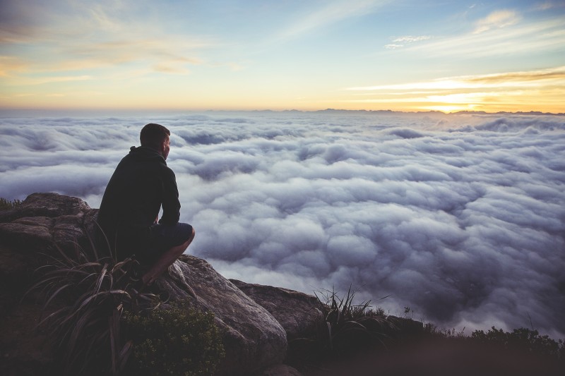 man-overlooking-clouds-from-unsplash-by-joshua-earle