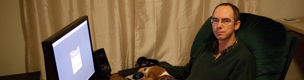 Mark at home working on writing.